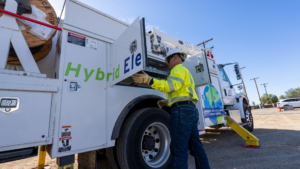 Employee utilizing an electric van